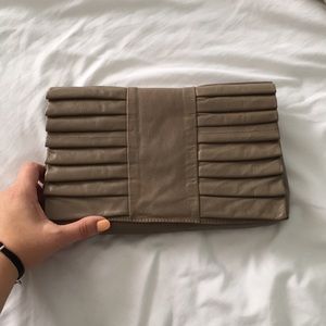 Tan leather clutch